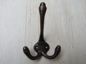Small 1883 Embossed Coat Hook Antique Copper.