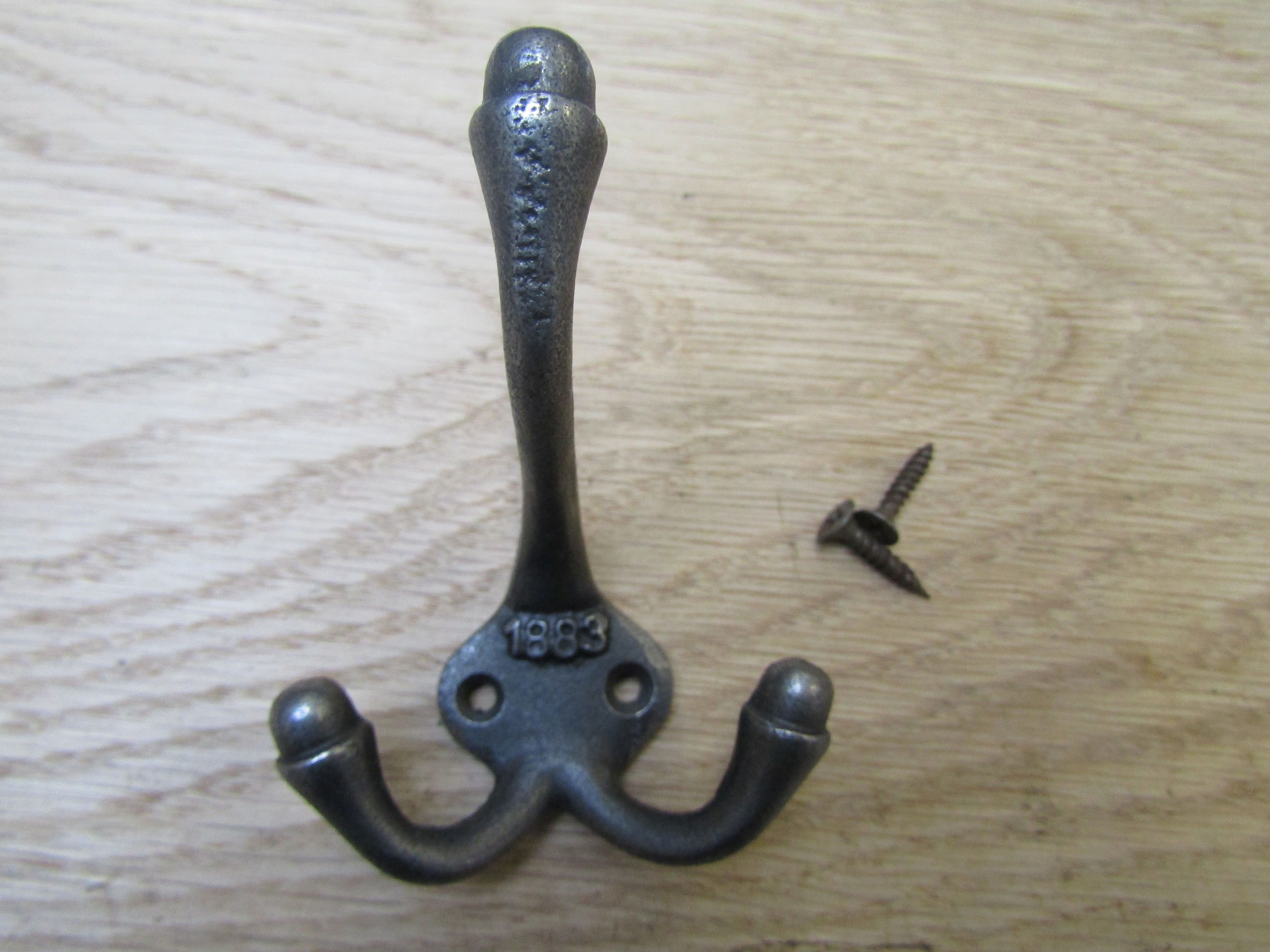 Pack Of 5 Large 1883 Embossed Coat Hooks Antique Iron.