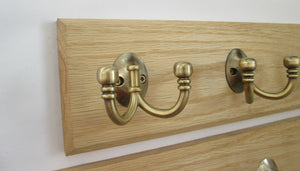 Antique Brass Double Ball End 5 Hook Coat Rail 58cm.