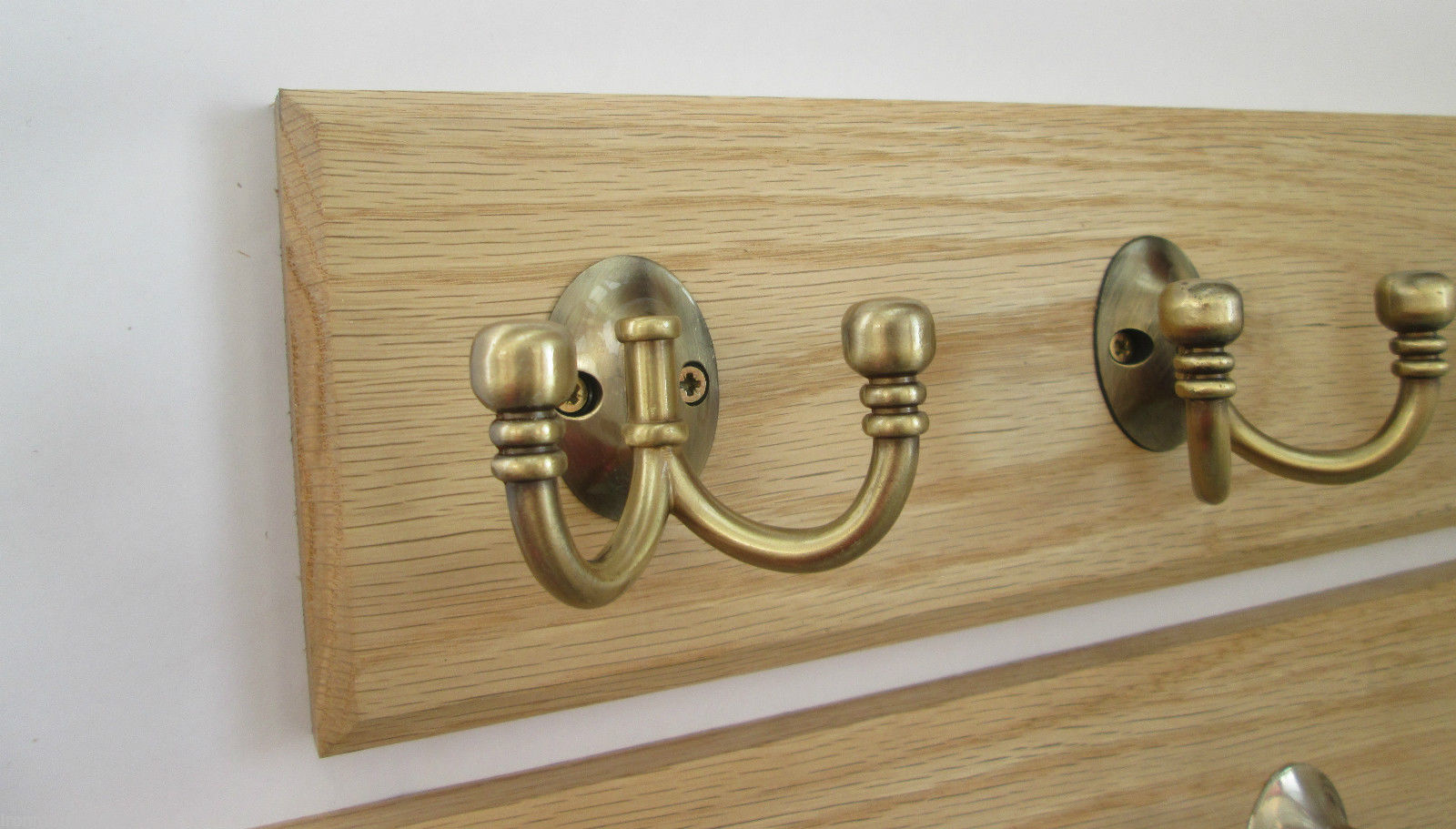 Antique Brass Double Ball End 8 Hook Coat Rail 88cm.