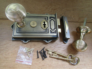 Cast Iron Davenport Rim Lock Antique Brass & Beehive Reeded Knob Polished Brass.