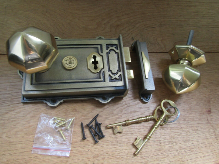 Cast Iron Davenport Rim Lock Antique Brass & Octagonal Rim Knob Polished Brass.