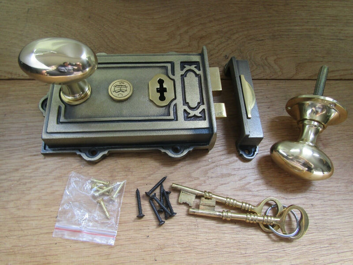 Cast Iron Davenport Rim Lock Antique Brass & Oval Rim Knob Polished Brass.