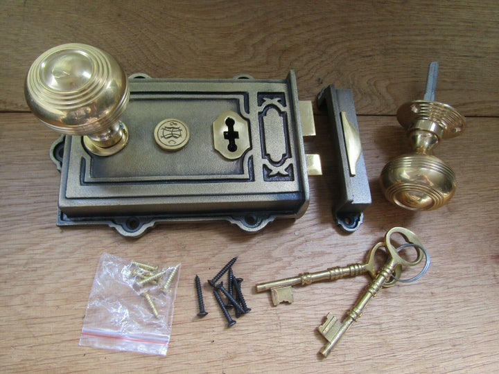 Cast Iron Davenport Rim Lock Antique Brass & Regency Rimmed Knob Polished Brass.