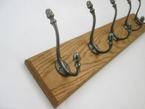 Antique Iron Acorn 6 Hook Coat Rail 68cm.