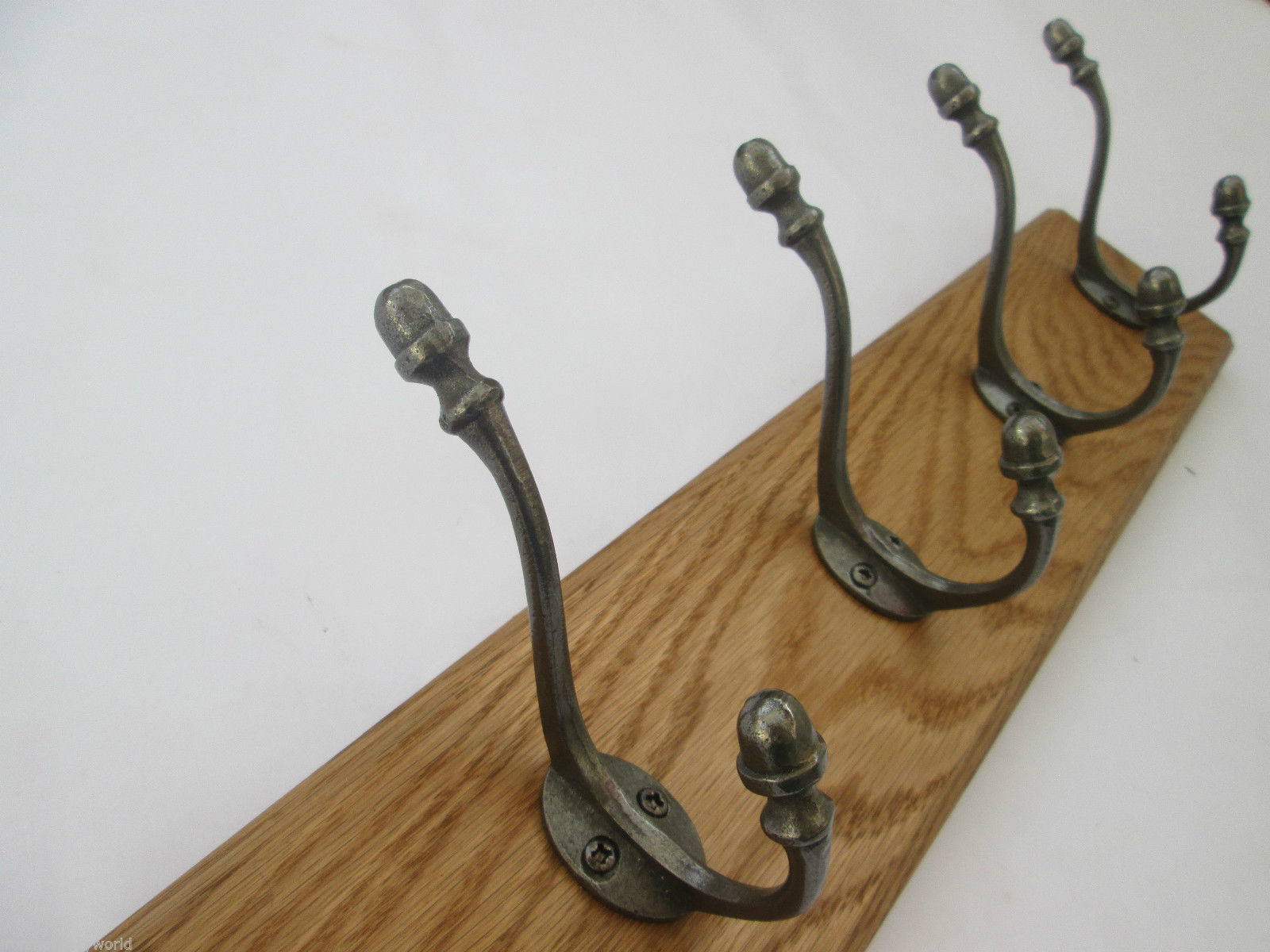 Antique Iron Acorn Coat Hook Rail.