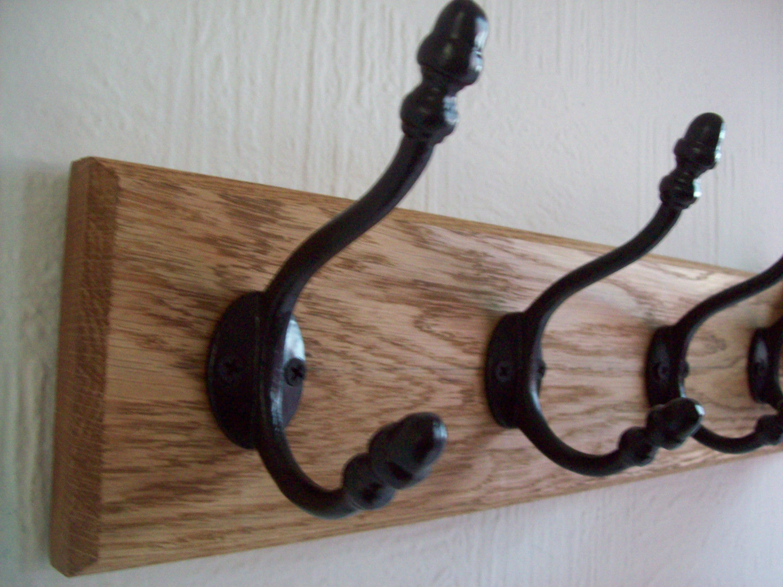 Black Antique Acorn 4 Hook Coat Rail 48cm.
