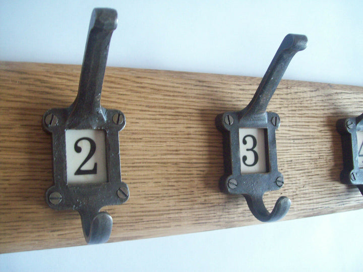 Antique Iron Ceramic Numbered 8 Hook Coat Rail 88cm.