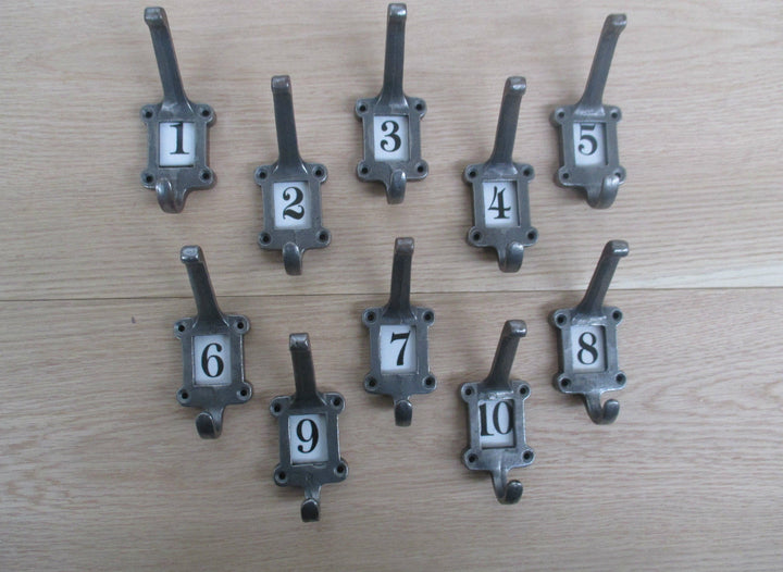 Ceramic Insert 1-10 Numbered Antique Iron Coat Hooks.