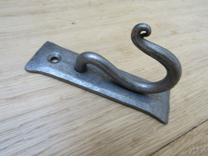 Curly Hook on Backplate antique iron.