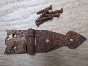 Pair Of Arrow Head Cabinet Hinges Rust.