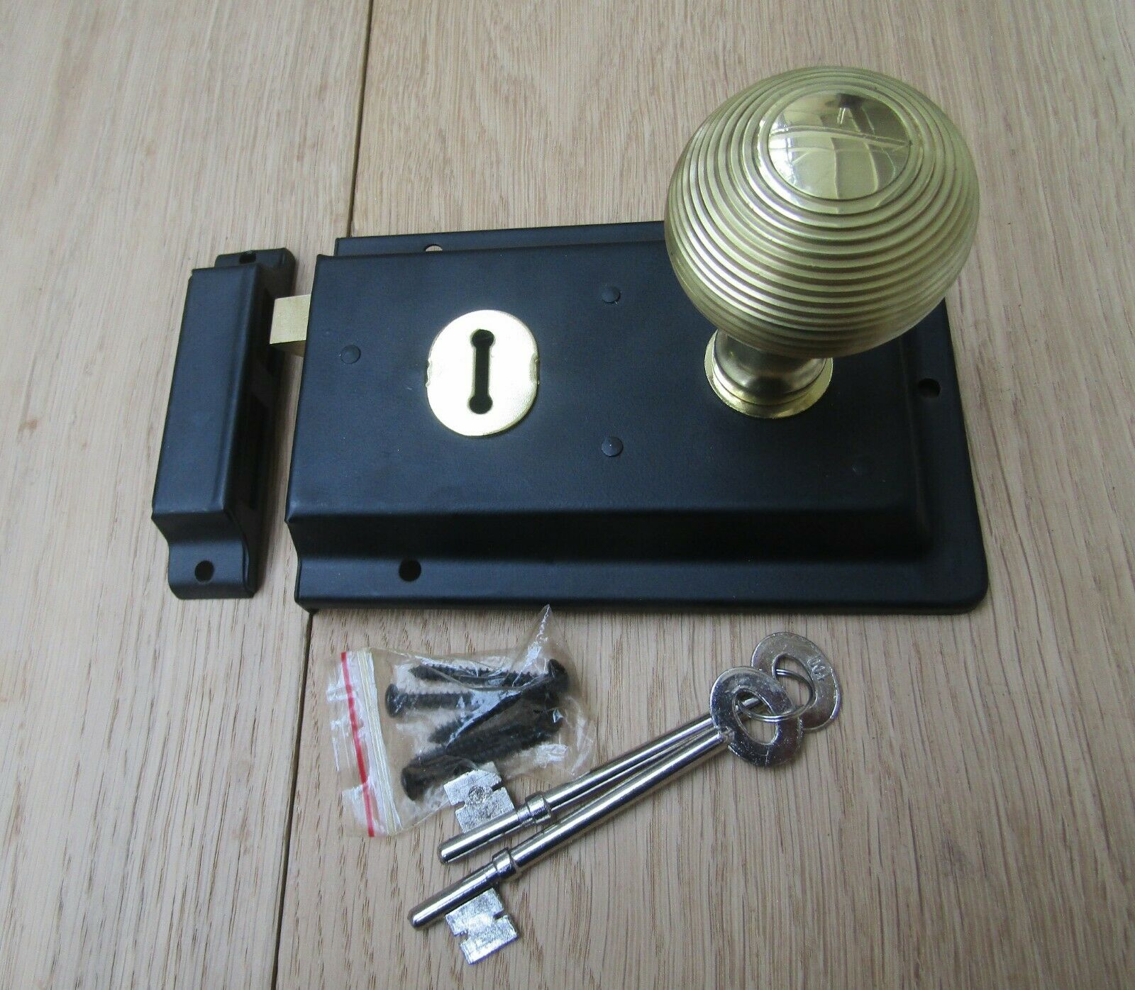 6inch Rim Lock Black & Reeded Rim Brass Set.