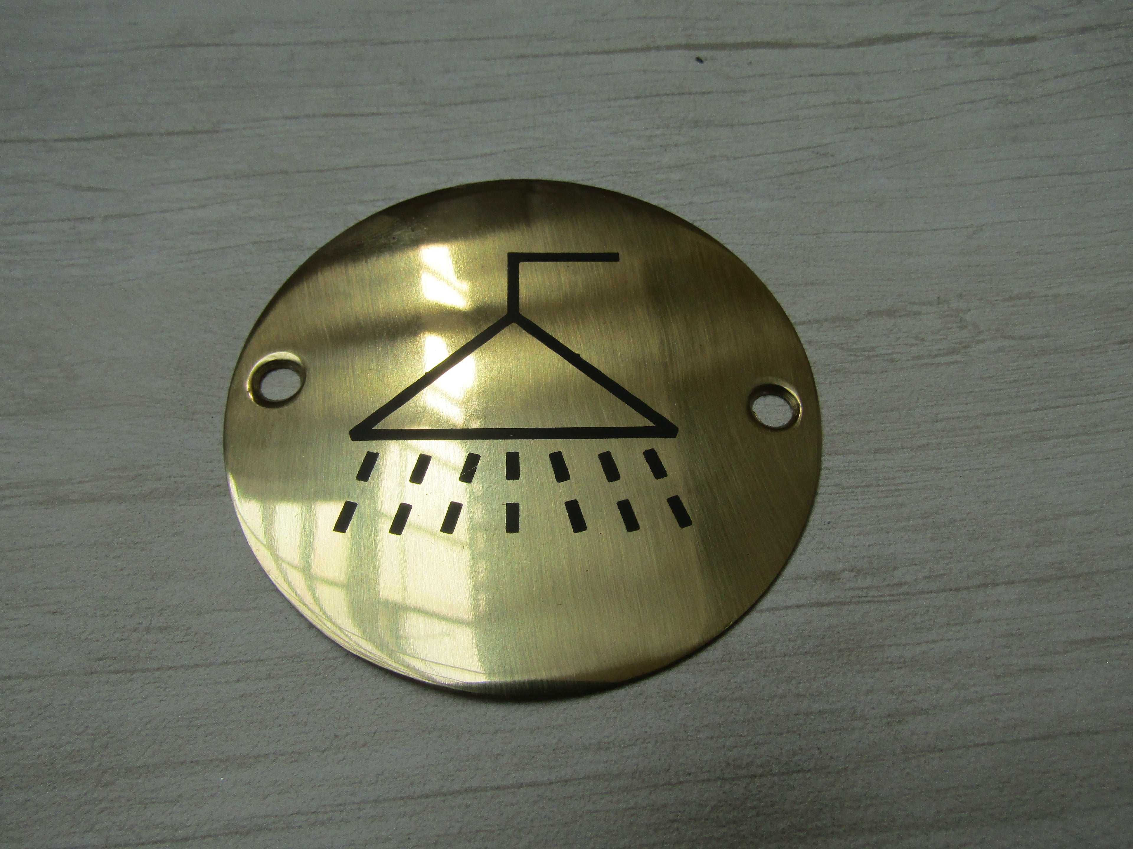 Circle Brass Shower Door Sign.