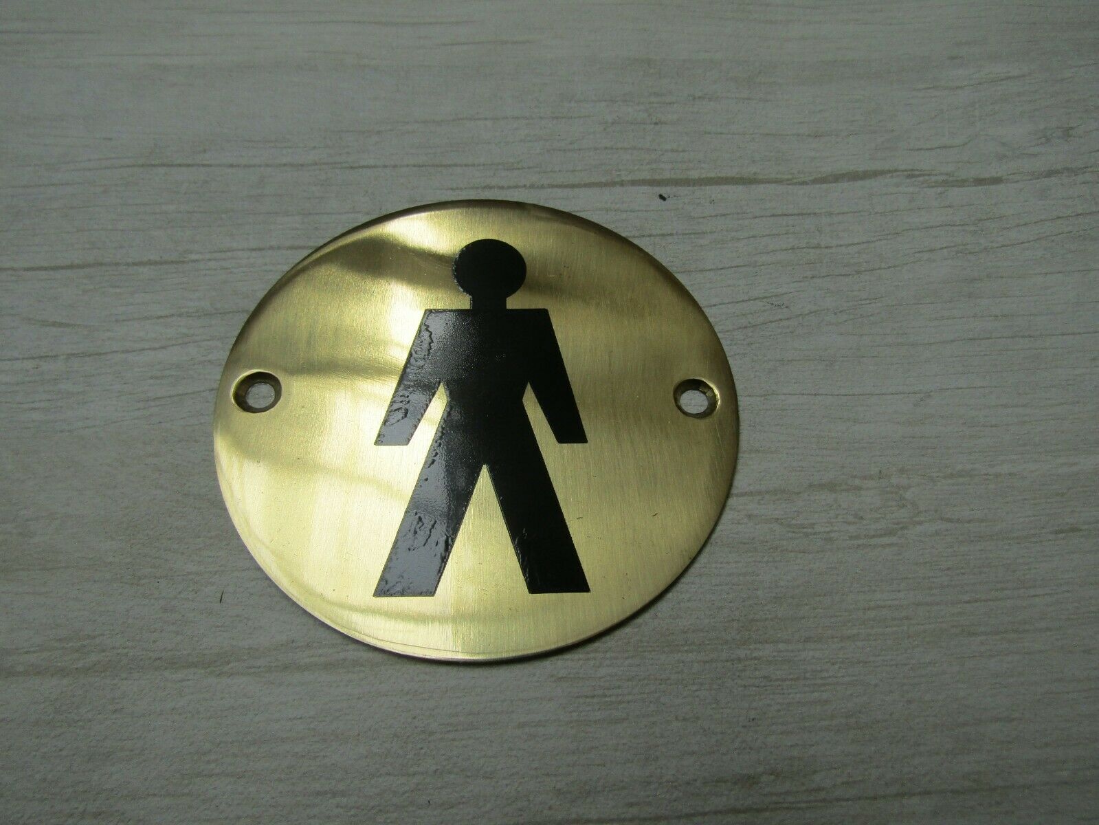 Circle Brass Male Door Sign.