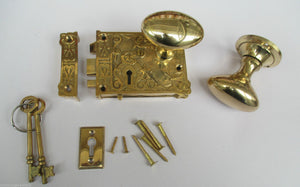 Ornate East Lake Lock & Oval Rim Brass Set.