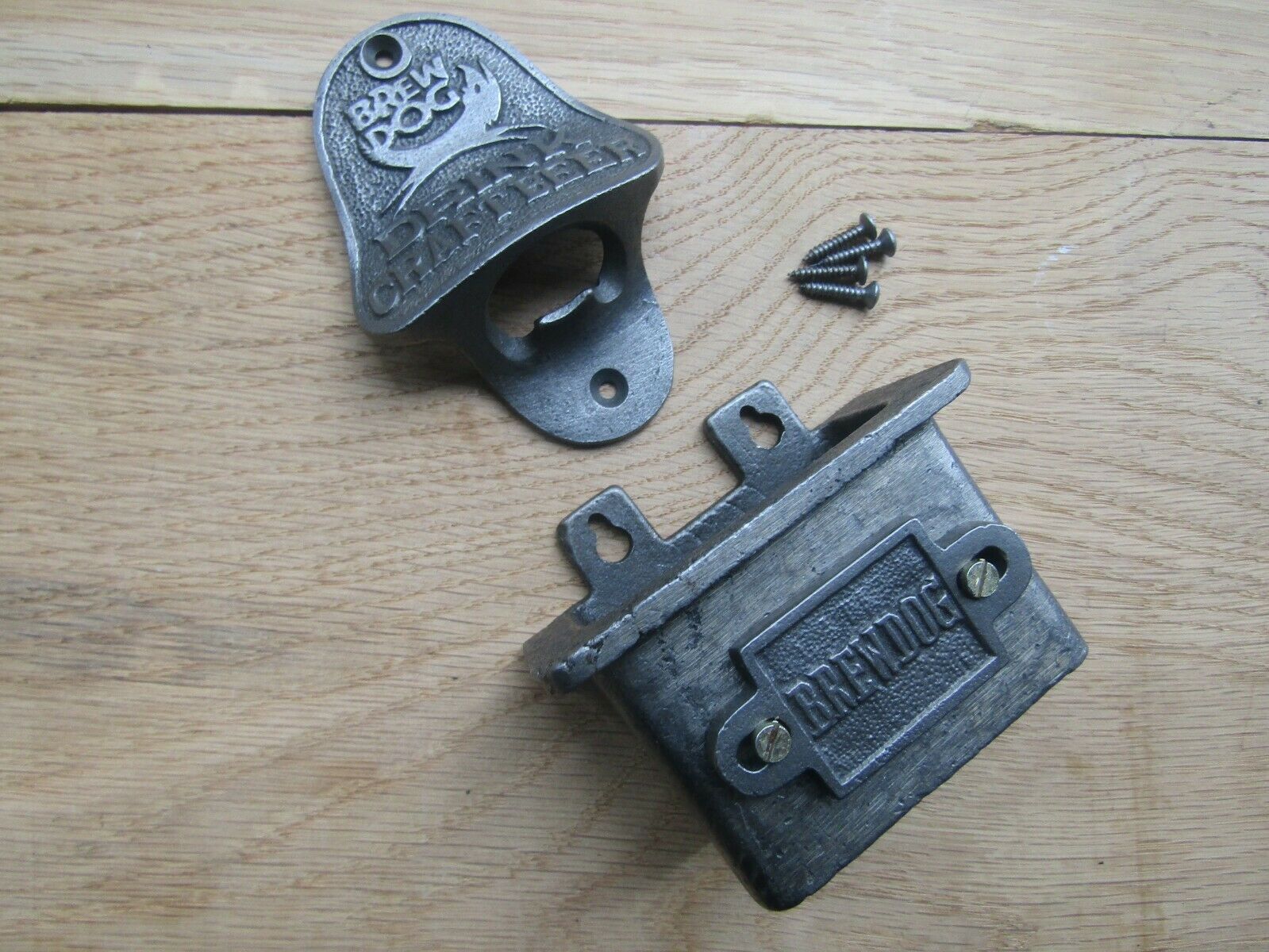 Cast Iron Brew Dog Opener and catcher.
