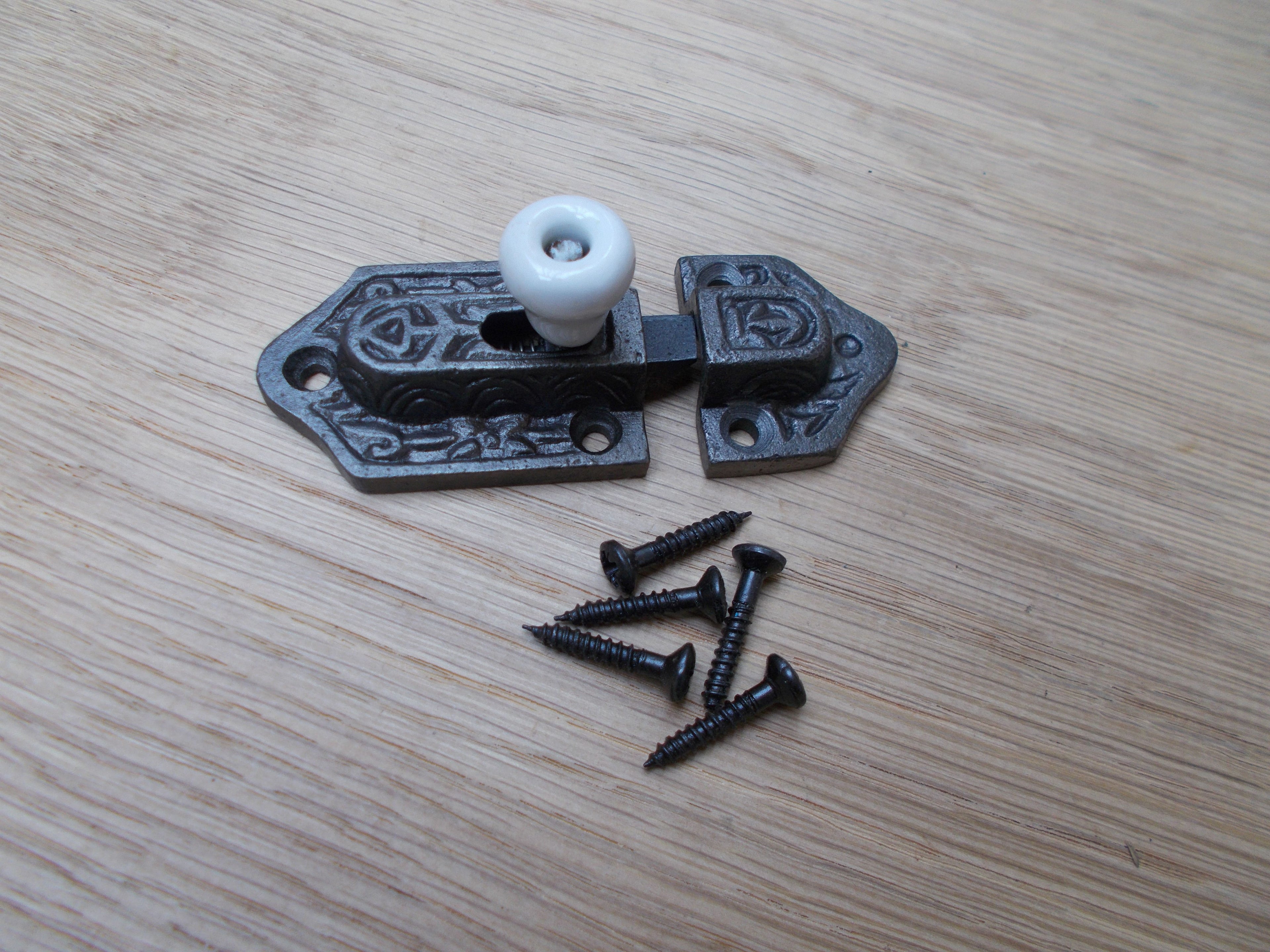 Ceramic knob bolt catch Antique Iron.