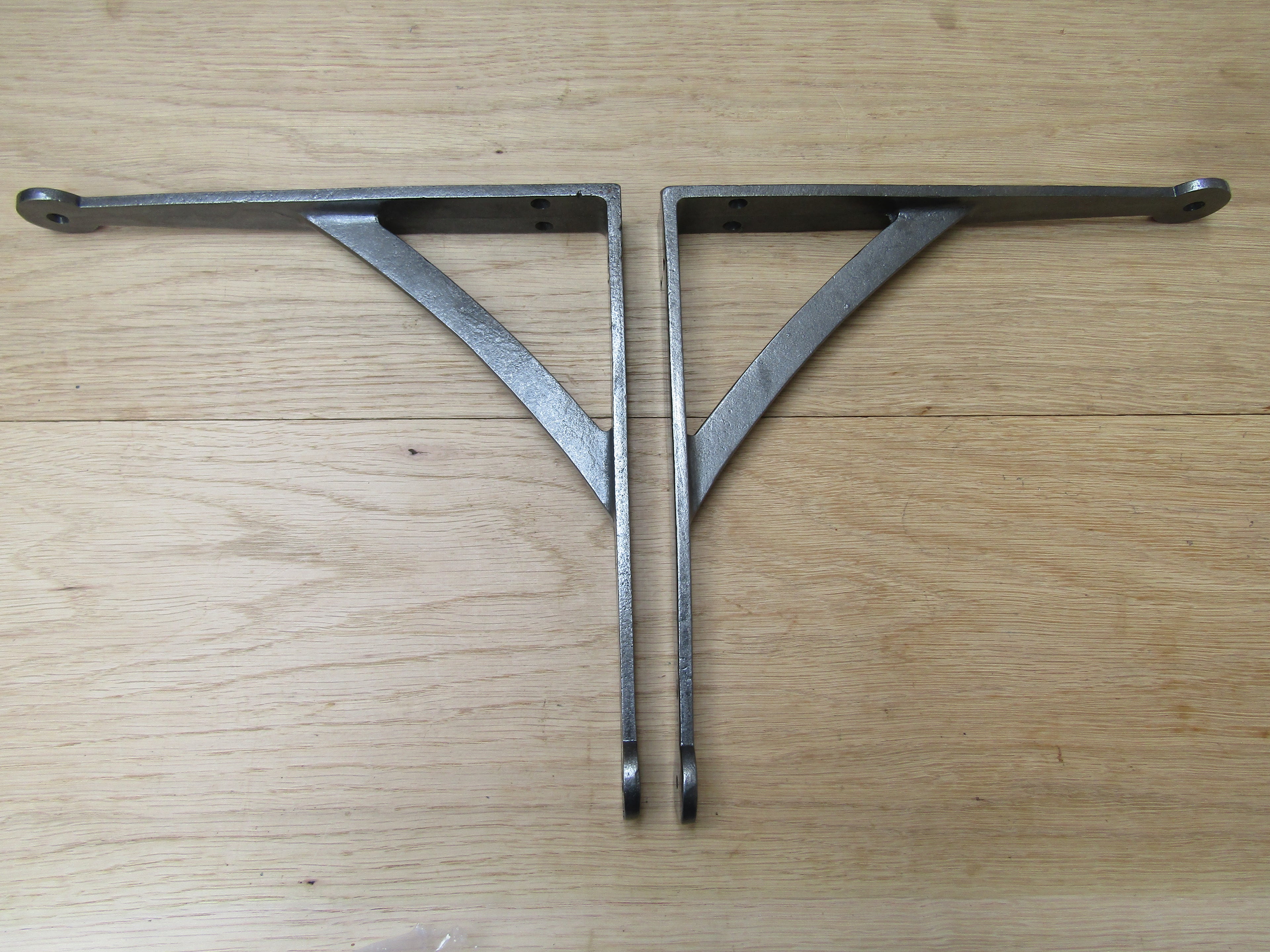Pair Of Hand Forged Penny End Shelf Brackets 12inch.
