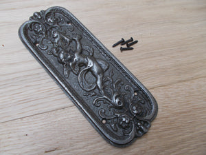 Antique Iron Cherub Finger Plate.