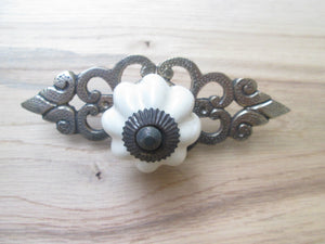 Cream Ceramic Cabinet Knob with Antique Brass Back Plate.