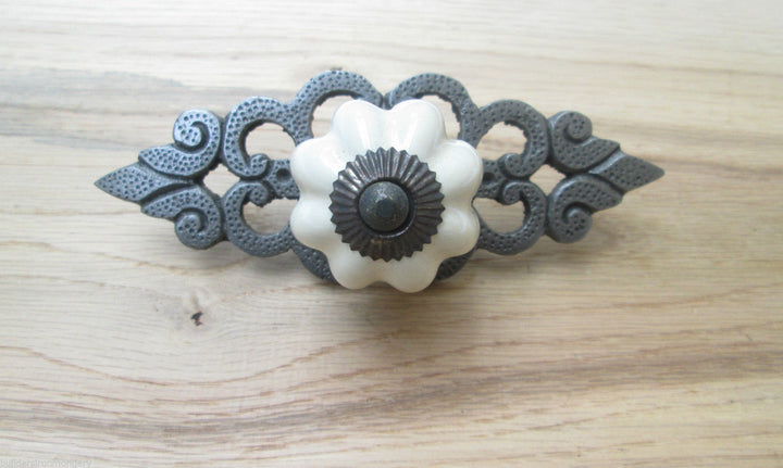 Cream Ceramic Cabinet Knob with Antique Iron Back Plate.