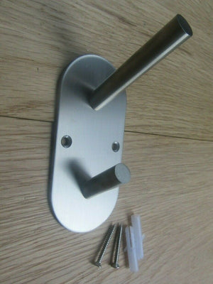 Satin Stainless Steel Double Peg Vertical on Plate.