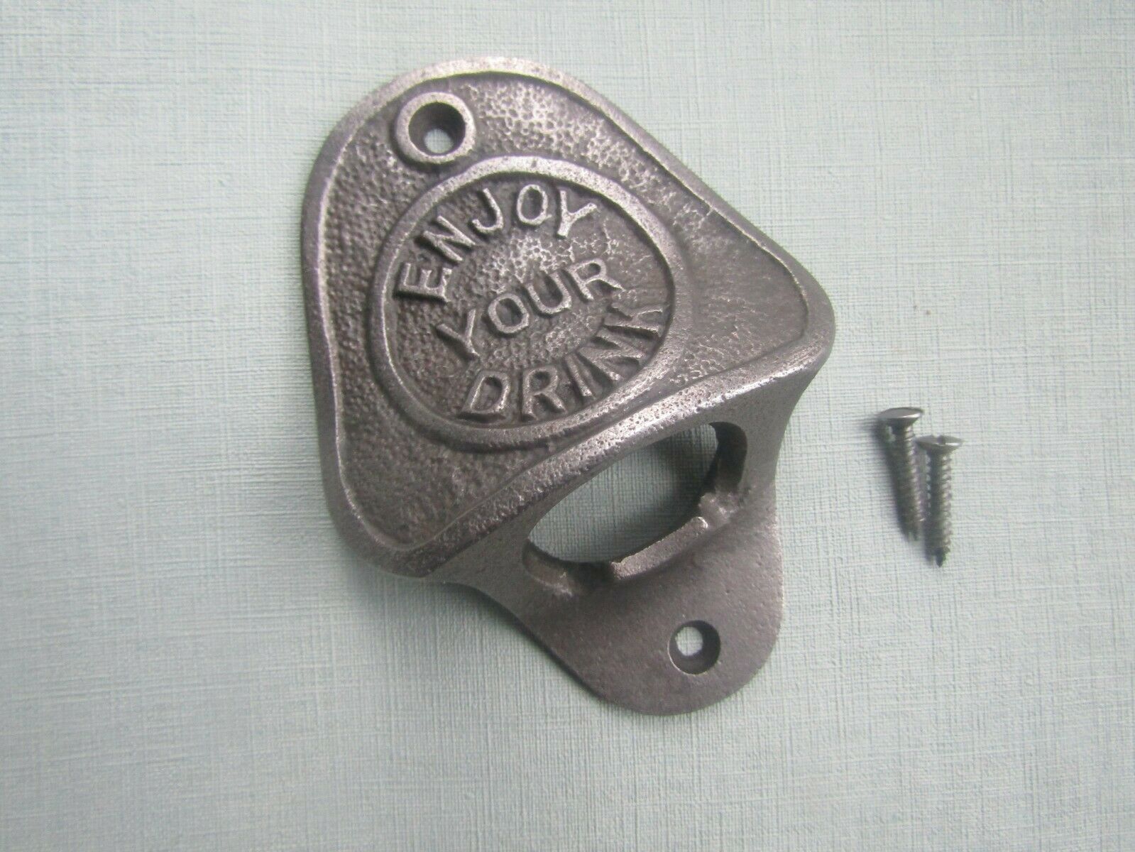 Cast Iron Enjoy your Drink Bottle Opener.