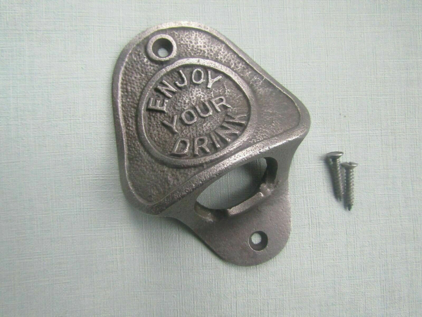Cast Iron Enjoy Your Drink Opener Only.