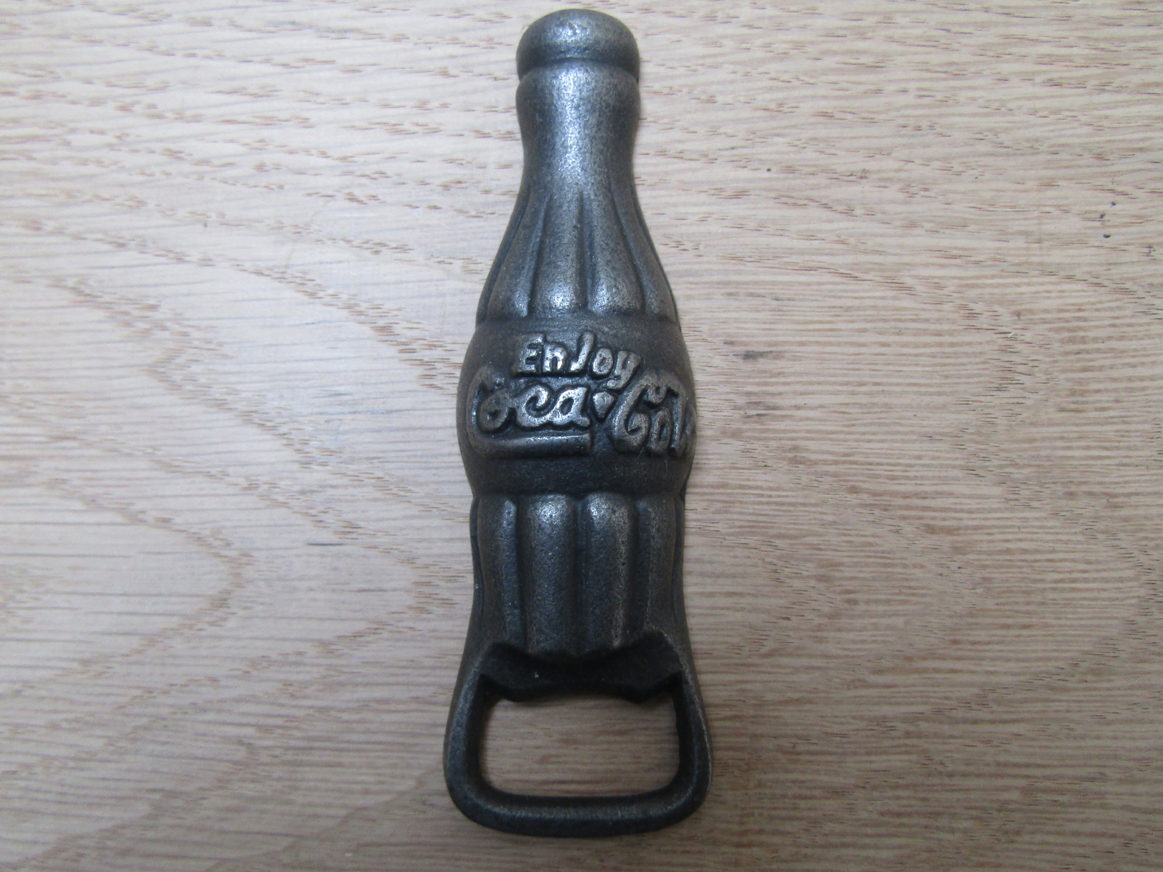 Cast Iron Enjoy Coca Cola Bottle Opener.