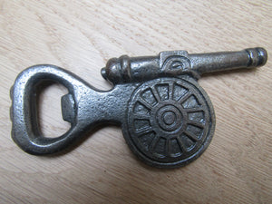 Cast Iron Gun Barrel Bottle Opener.
