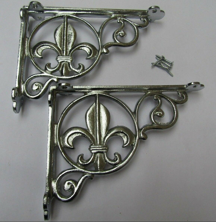 Pair Of Fleur De Lys Shelf Brackets Chrome.