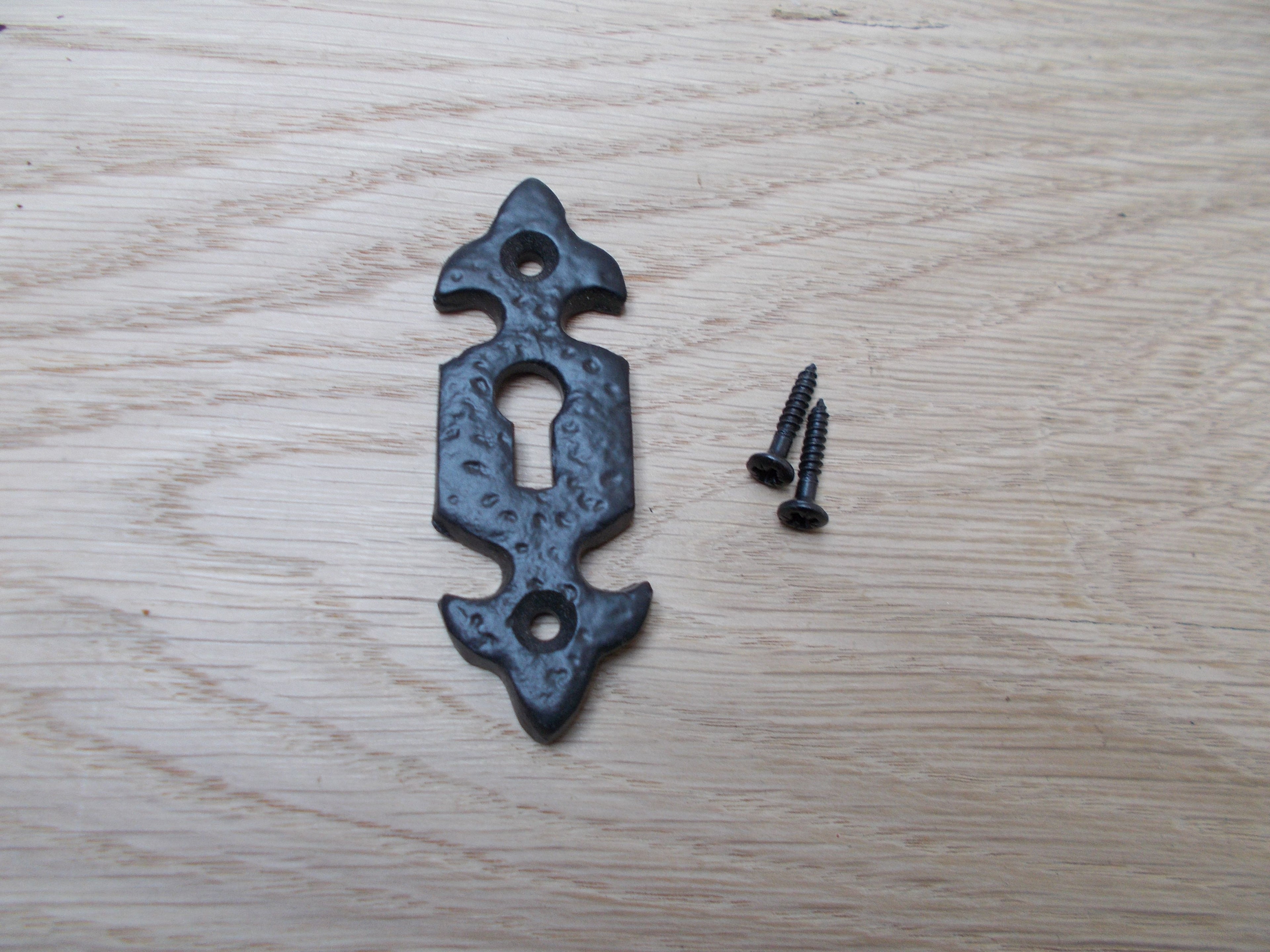 Fleur De Lys Open Escutcheon Black Antique.