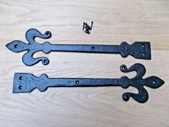 Pair of hinge fronts black antique 16inch Fleur de lys.