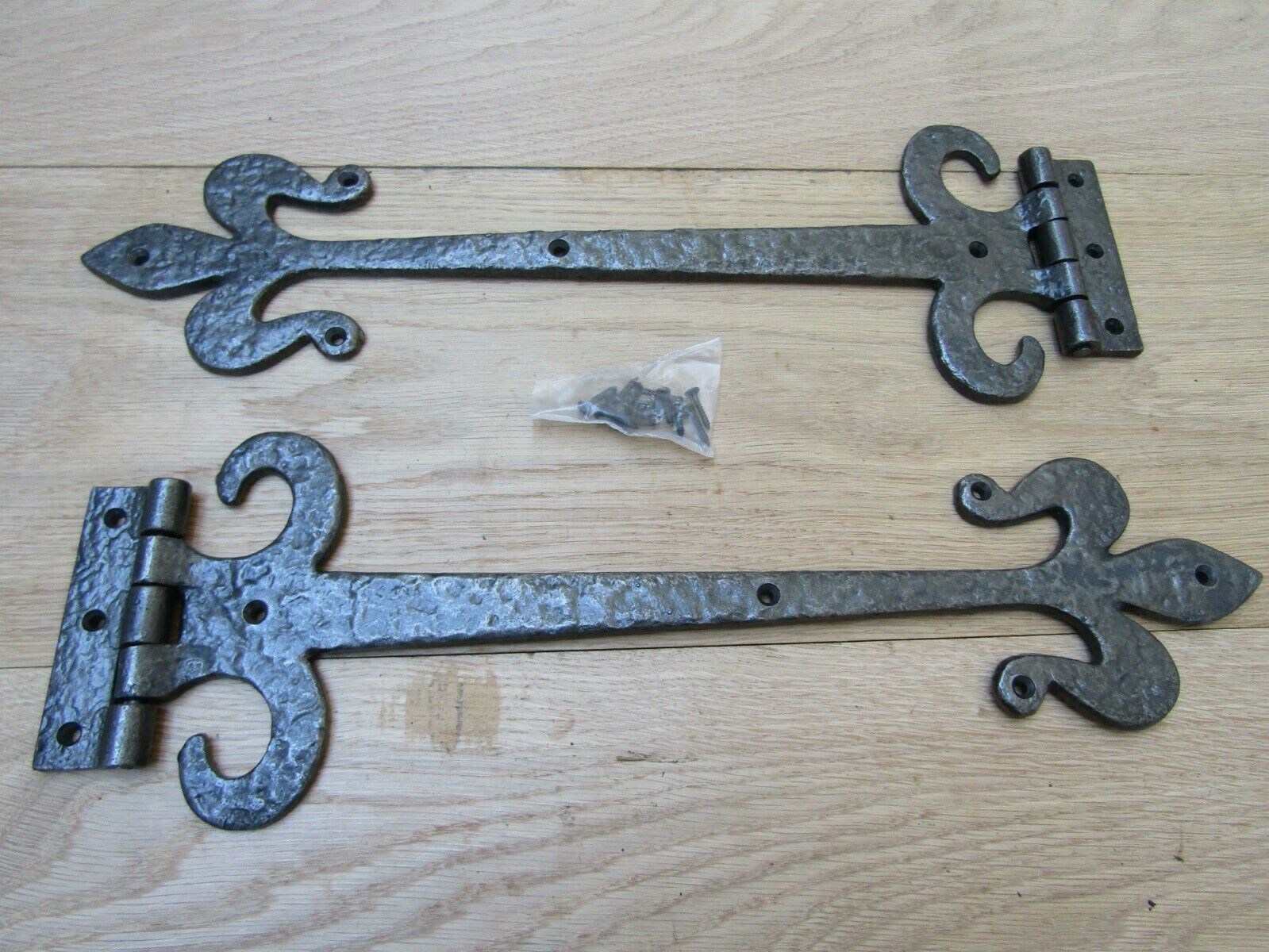 Pair of 18inch Fleur de lys with Curls Antique Iron Hinges.