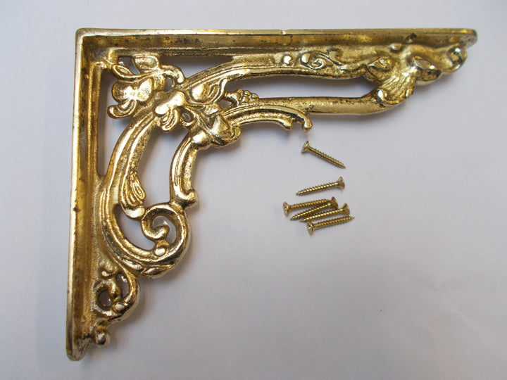 Pair Of Floral Shelf Brackets Polished Brass 8inch.