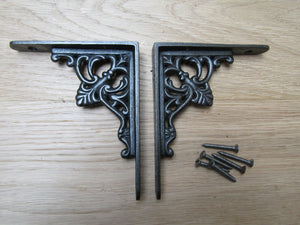 Pair Of Floret Shelf Brackets Antique iron.