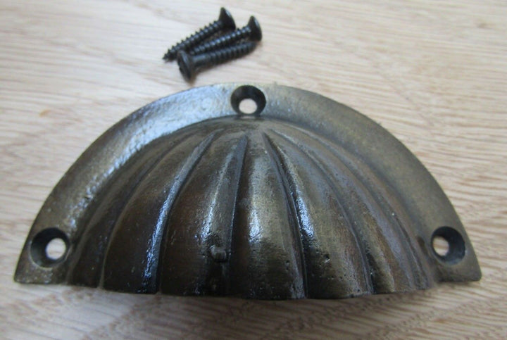 Fluted Cup Pull Handle Antique Brass on Iron.