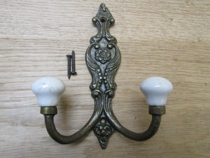 French Ornate Ceramic Hook Antique Brass.