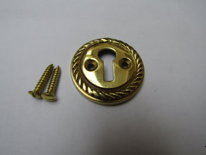 Georgian Open Escutcheon Polished Brass.