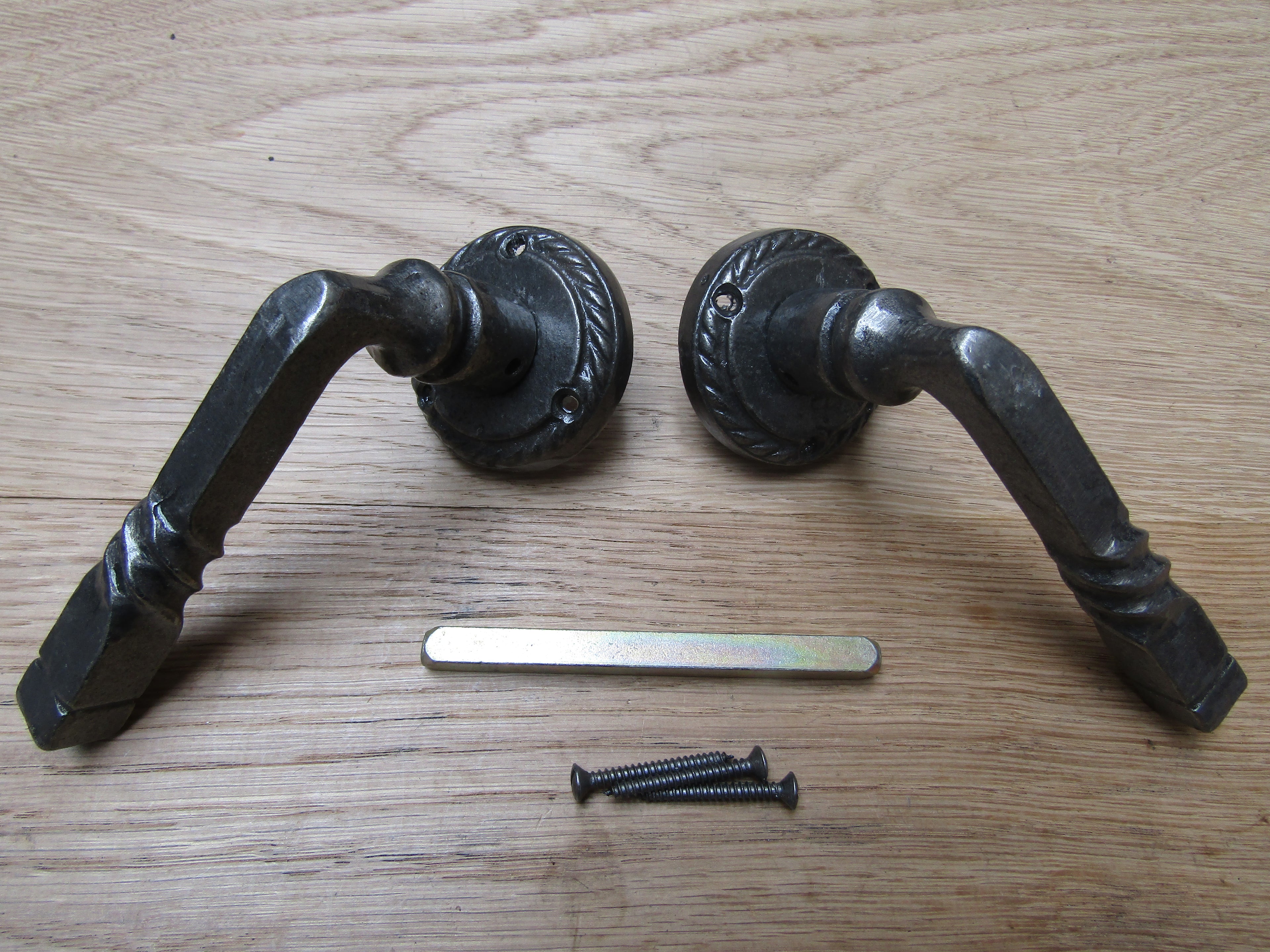 Pair Of Twisted Lever On Rose Door Handles Antique Iron.