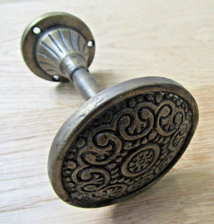Inca Curtain Hold back Antique Brass.