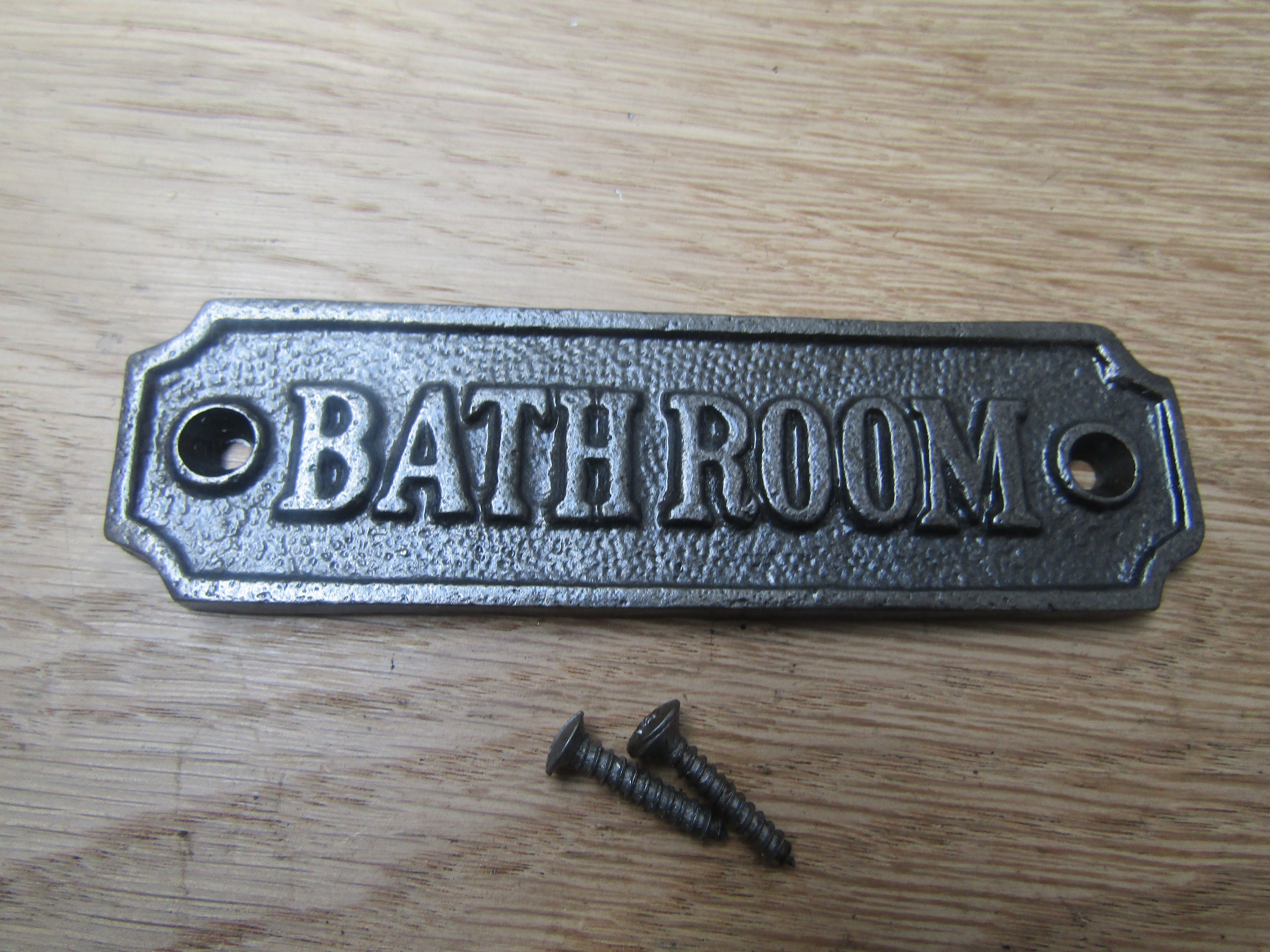 Cast Iron Bathroom Plaque.