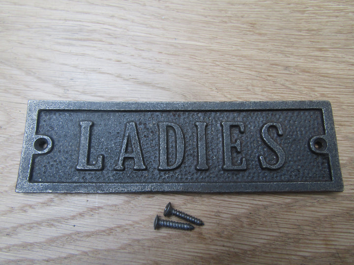 Cast Iron Ladies Plaque.