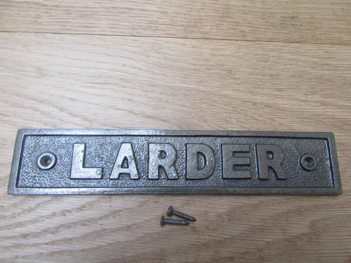 Cast Iron Larder Plaque.