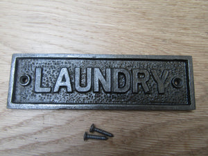 Cast Iron Laundry Plaque.