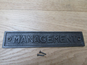 Cast Iron Management Plaque.