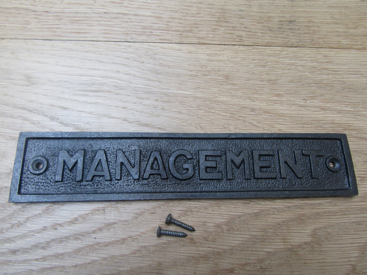 Cast Iron Management Plaque.