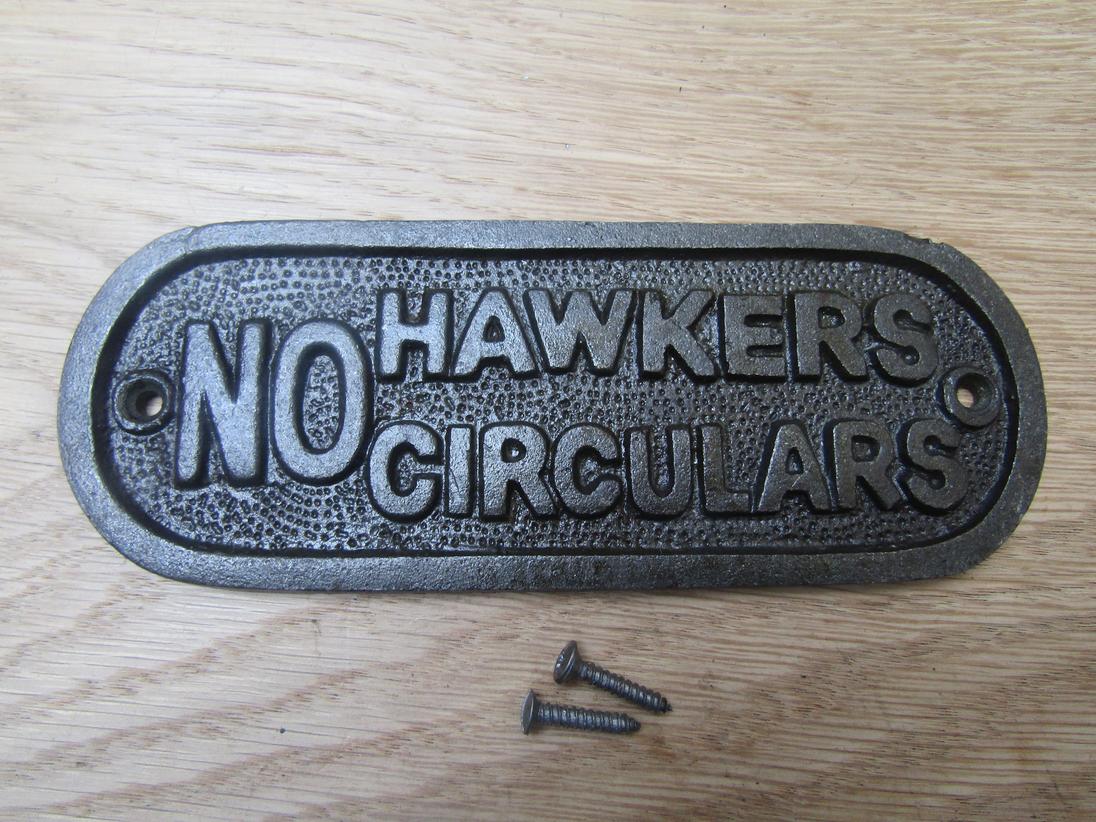 Cast Iron No Hawkers Circulars Plaque.
