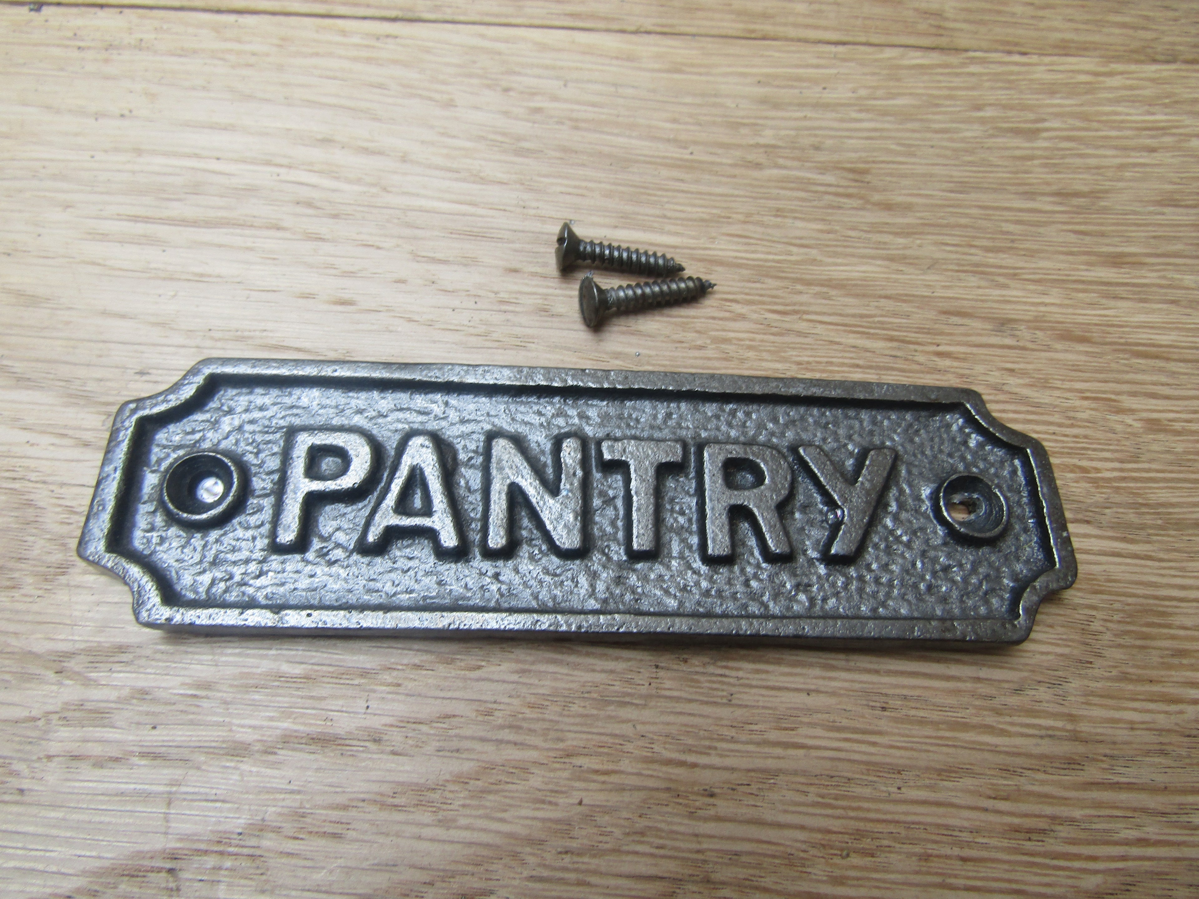 Cast Iron Pantry Plaque.