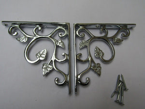 Pair Of Small Leaf Shelf Brackets Polished Chrome.